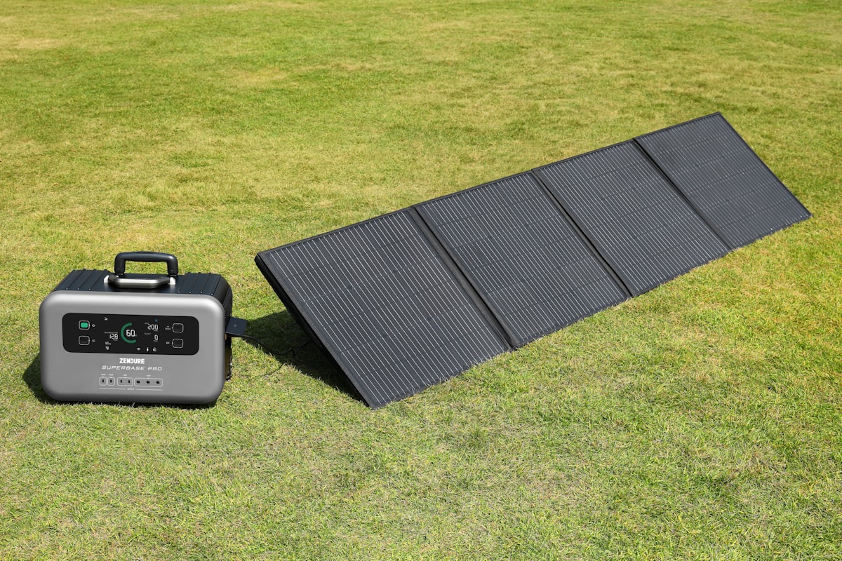 Portable power station connected to a solar panel outdoors